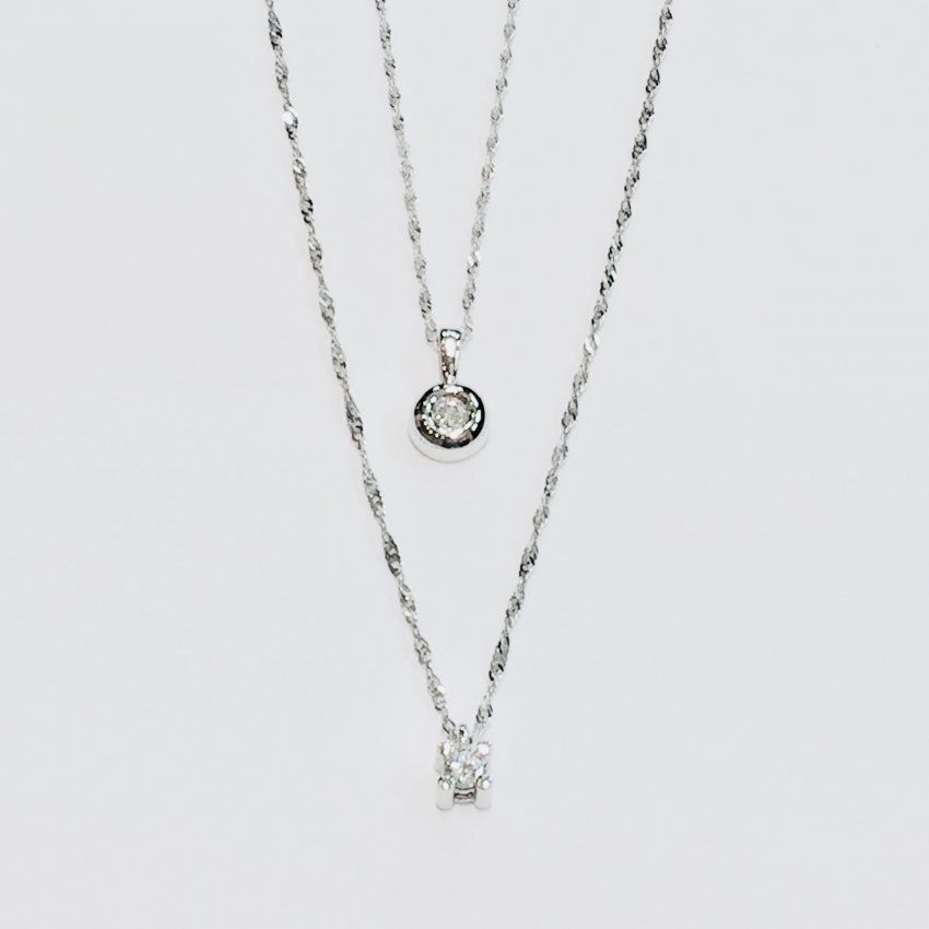 Colgante garras y chaton con cadena en oro blanco y diamante
