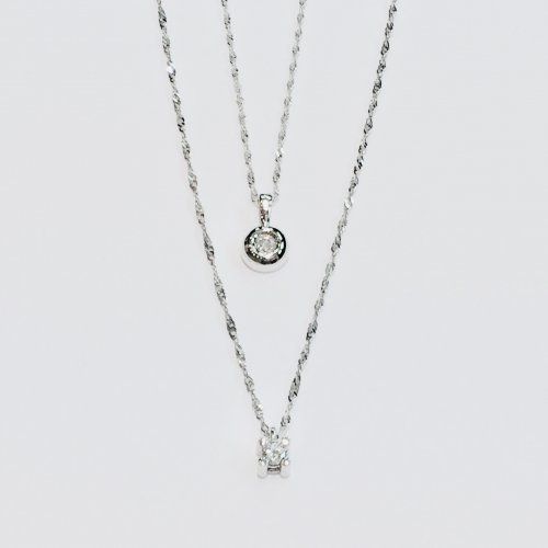 Colgante garras y chaton con cadena en oro blanco y diamante